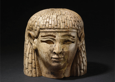 Head of a woman with full Egyptian hairstyle