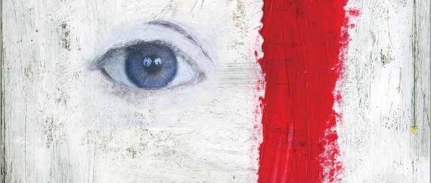 Image of a close-up of the eye of a painted face with a red stripe down the side