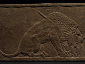 Photo of Dying Lion wall-panel relief, gypsum, 645-640 BCE