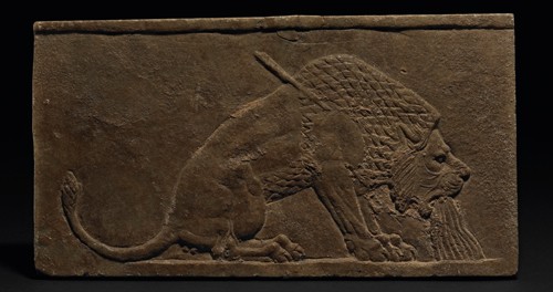 Photo of Dying Lion wall-panel relief, gypsum, 645-640 BCE